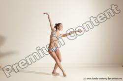 Swimsuit Gymnastic poses Woman White Moving poses Slim long brown Dynamic poses Academic